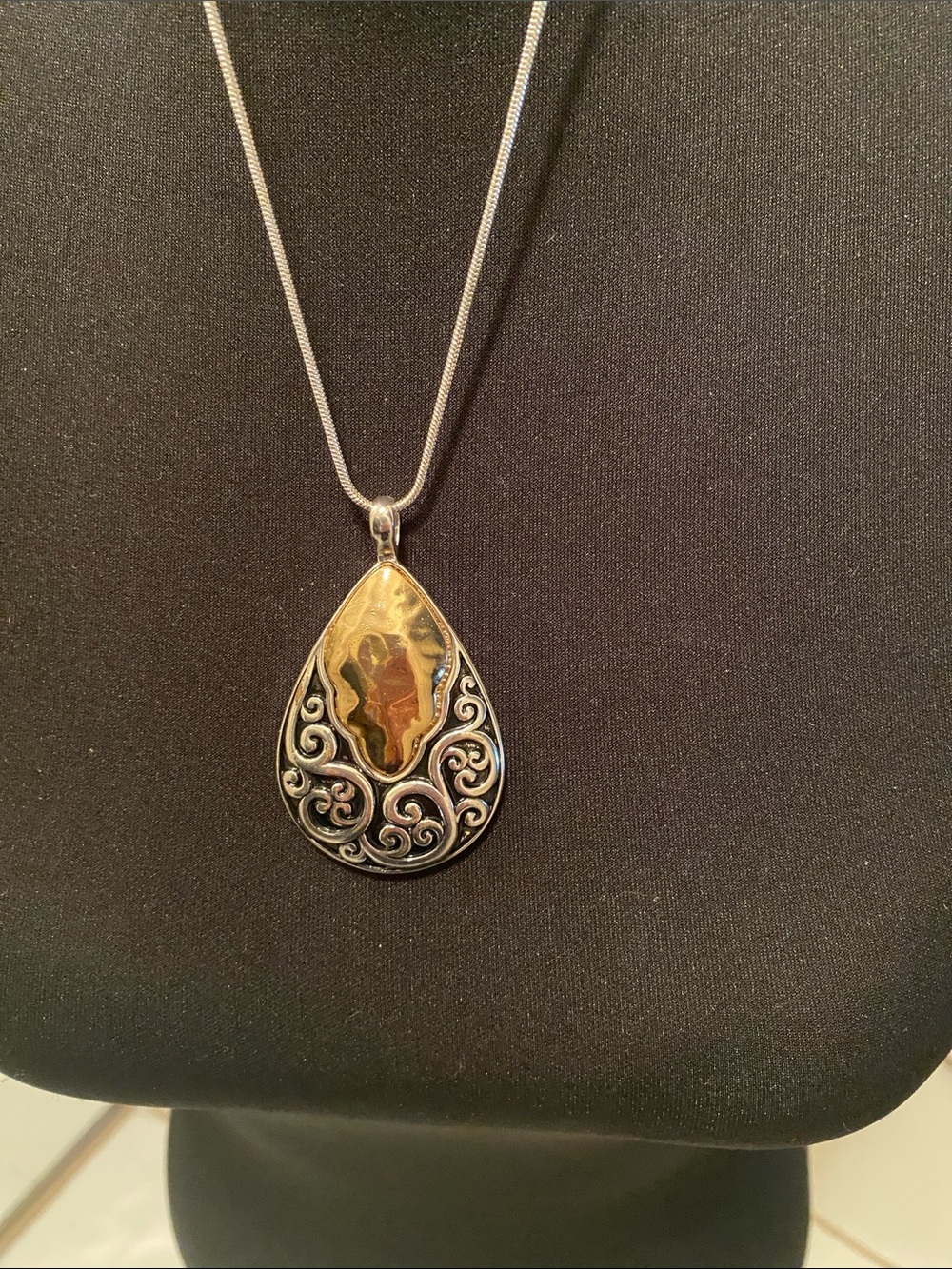 Silver Teardrop Pendant Necklace with Gold-Tone Accent